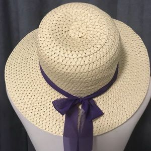 Soft straw/looking hat with purple ribbon